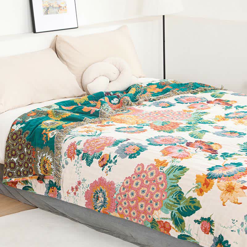 Couette réversible en gaze de coton multicouche avec motif floral et pompons