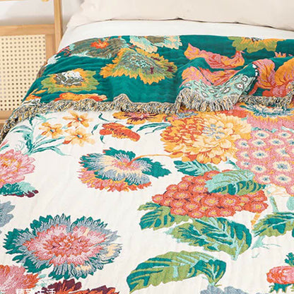 Couette réversible en gaze de coton multicouche avec motif floral et pompons
