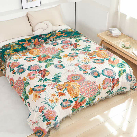 Couette réversible en gaze de coton multicouche avec motif floral et pompons