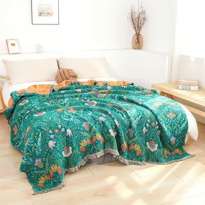 Couette réversible en gaze de coton avec pompons floraux