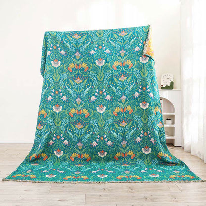 Couette réversible en gaze de coton avec pompons floraux