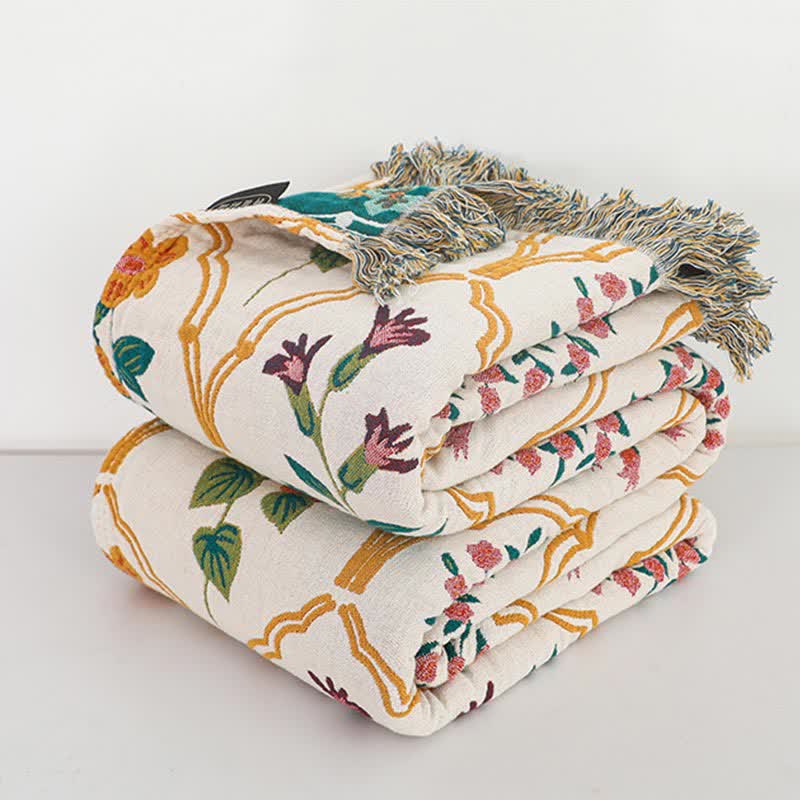 Couette réversible en gaze de coton à motif losanges et fleurs
