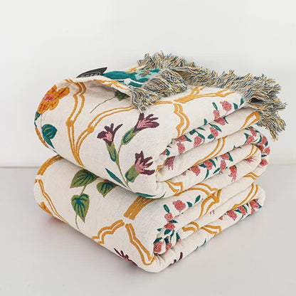 Couette réversible en gaze de coton à motif losanges et fleurs