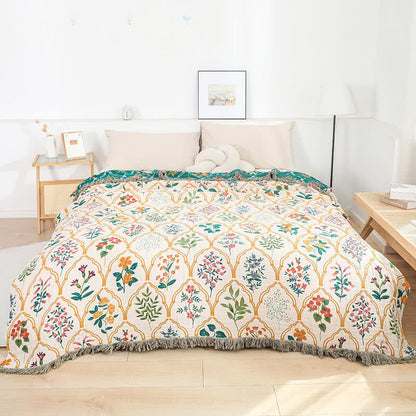 Couette réversible en gaze de coton à motif losanges et fleurs