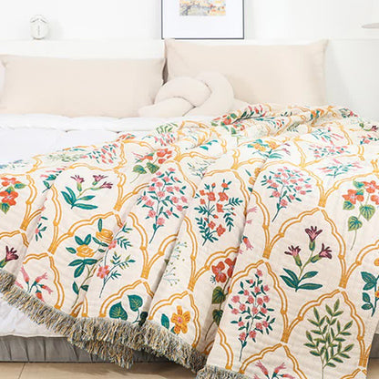 Couette réversible en gaze de coton à motif losanges et fleurs