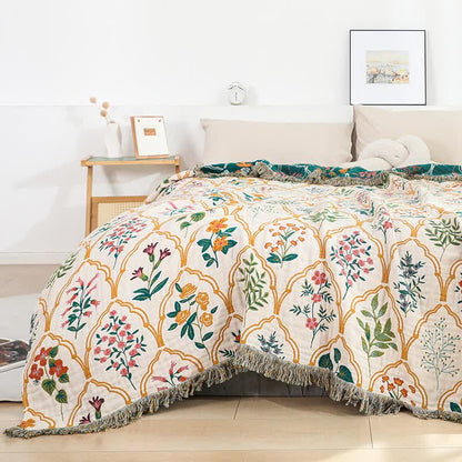 Couette réversible en gaze de coton à motif losanges et fleurs