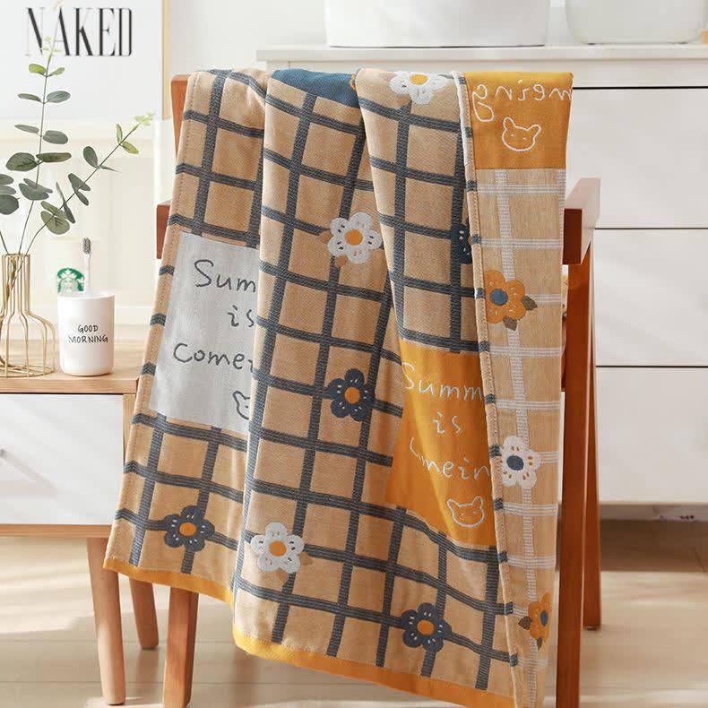 Serviette de bain en gaze de coton à motif floral et à carreaux