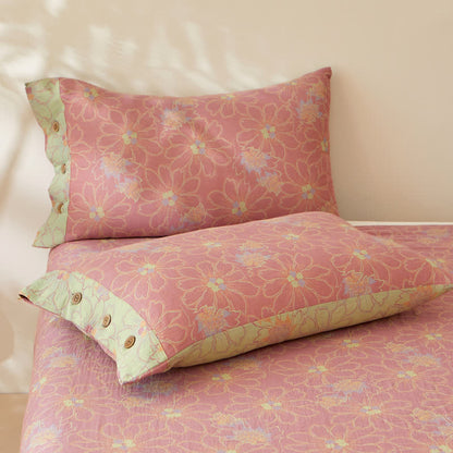 Couvre-lit réversible en gaze de coton teint en fil avec un motif floral frais
