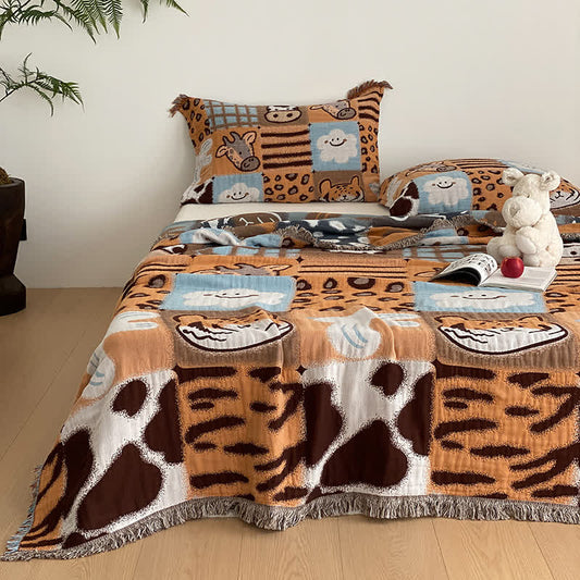 Couette en gaze de coton à quatre couches avec pompons et imprimé animalier