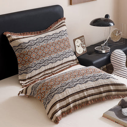 Couette en gaze de coton à quatre couches avec pompons de style ethnique