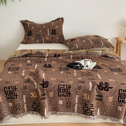 Couette rétro à quatre couches en gaze de coton avec pompons