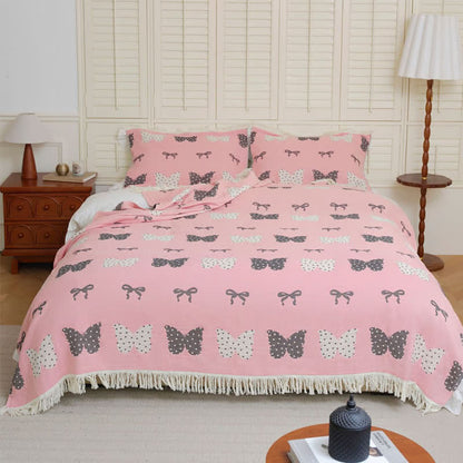 Couette douce en gaze de coton pur avec nœud papillon et pompon