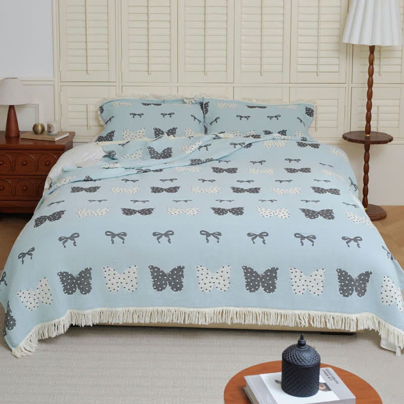 Couette douce en gaze de coton pur avec nœud papillon et pompon