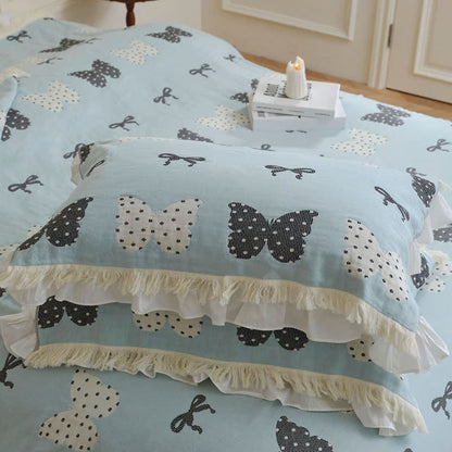 Couette douce en gaze de coton pur avec nœud papillon et pompon