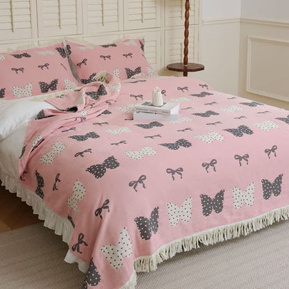 Couette douce en gaze de coton pur avec nœud papillon et pompon
