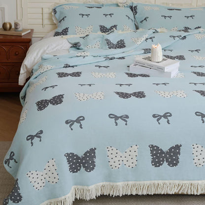 Couette douce en gaze de coton pur avec nœud papillon et pompon