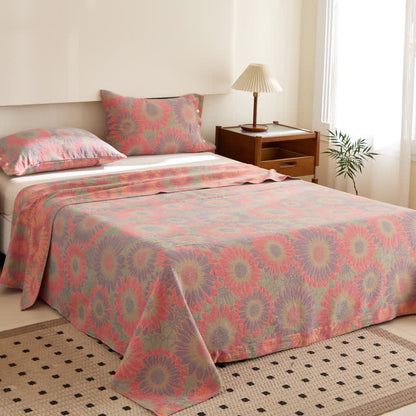 Couverture réversible jacquard double épaisseur, teinte en fil, en coton tournesol