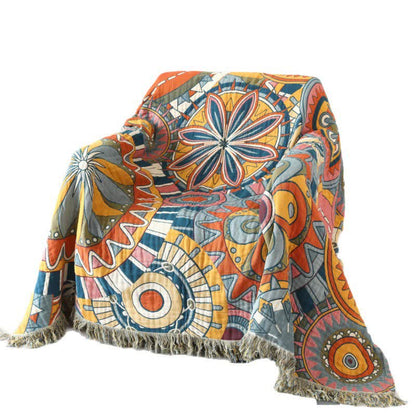 Couette réversible en gaze de coton avec motif floral artistique et pompons