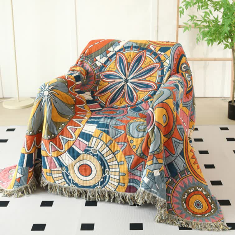 Couette réversible en gaze de coton avec motif floral artistique et pompons