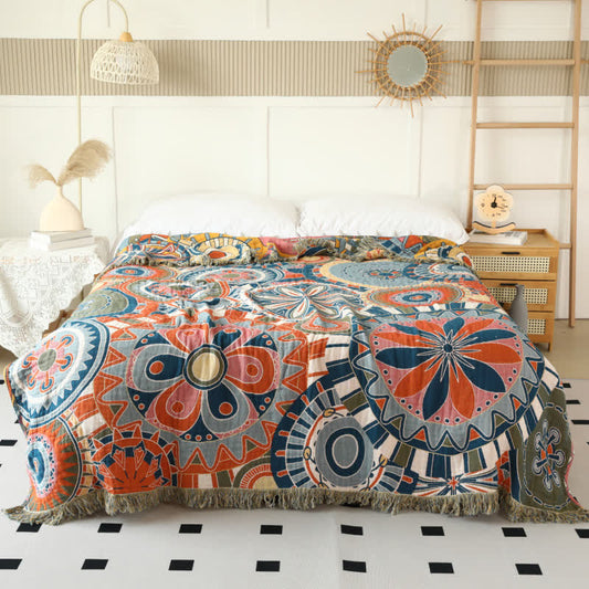Couette réversible en gaze de coton avec motif floral artistique et pompons