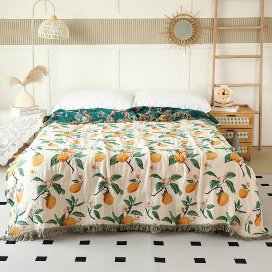 Couette réversible en gaze de coton à motif citron et pompons