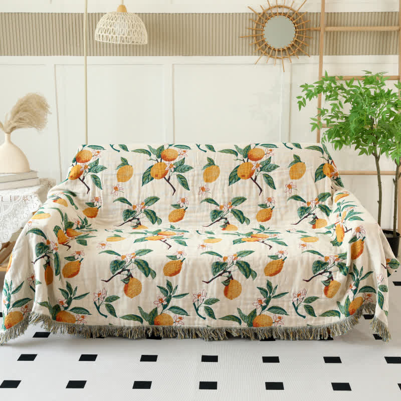 Couette réversible en gaze de coton à motif citron et pompons