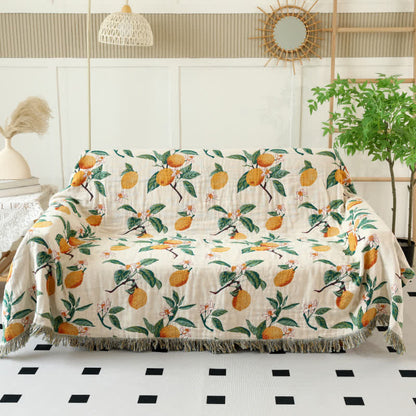 Couette réversible en gaze de coton à motif citron et pompons