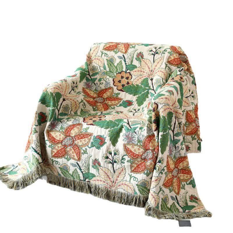 Couette réversible en gaze de coton avec motif floral et feuilles et pompons