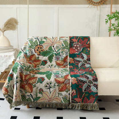 Couette réversible en gaze de coton avec motif floral et feuilles et pompons