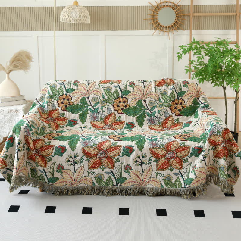 Couette réversible en gaze de coton avec motif floral et feuilles et pompons