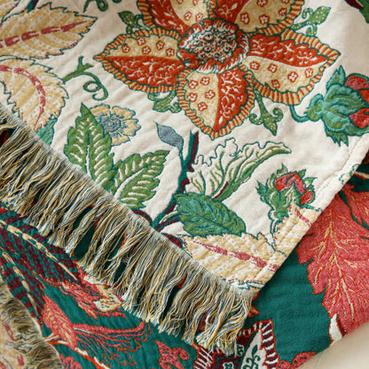 Couette réversible en gaze de coton avec motif floral et feuilles et pompons