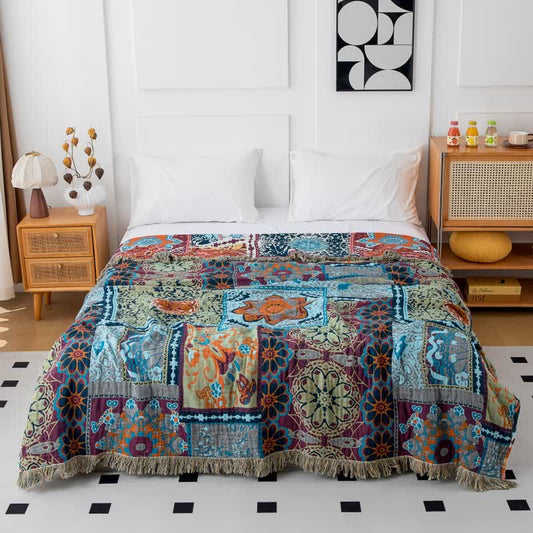 Couette bohème en coton avec pompons réversibles et fleurs bleues