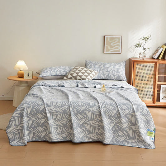 Élégante couverture réversible en gaze de coton double épaisseur avec des feuilles
