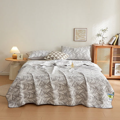 Élégante couverture réversible en gaze de coton double épaisseur avec des feuilles