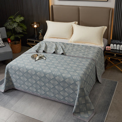 Couette géométrique à motif de losanges et coton teint en fil
