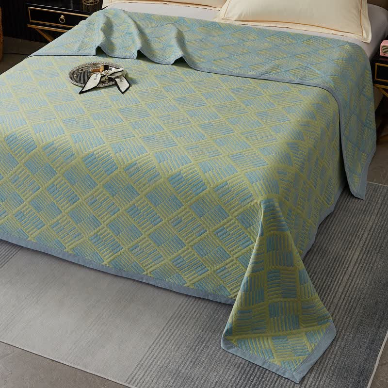 Couette géométrique à motif de losanges et coton teint en fil