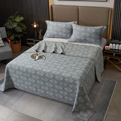 Couette géométrique à motif de losanges et coton teint en fil