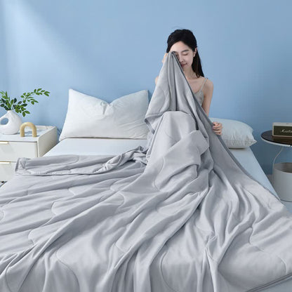Couette rafraîchissante à structure ondulée unie
