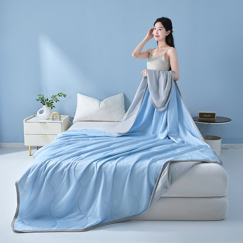 Couette rafraîchissante à structure ondulée unie