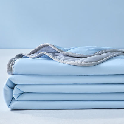 Couette rafraîchissante à structure ondulée unie