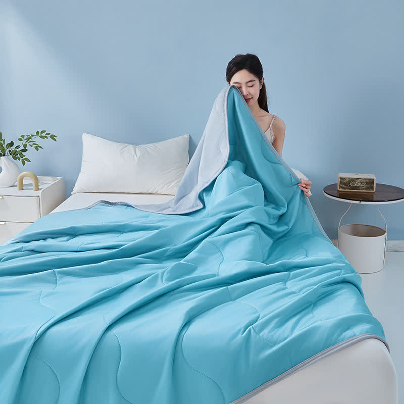 Couette rafraîchissante à structure ondulée unie