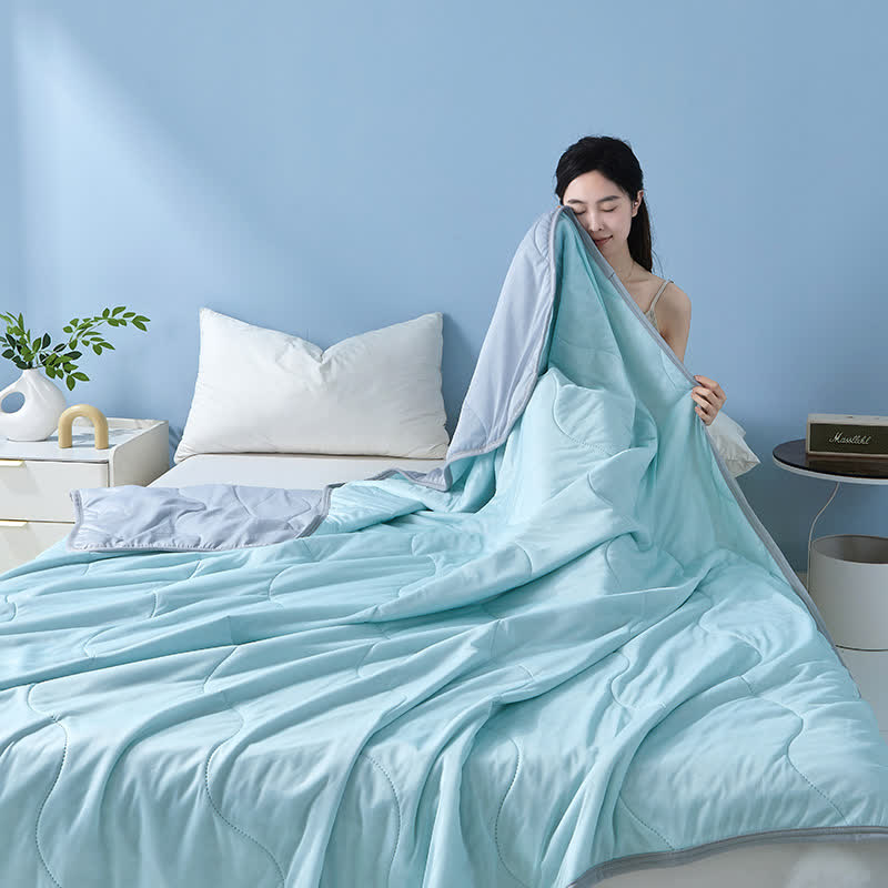 Couette rafraîchissante à structure ondulée unie