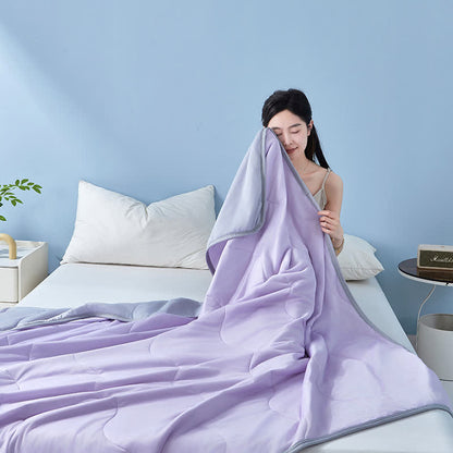 Couette rafraîchissante à structure ondulée unie