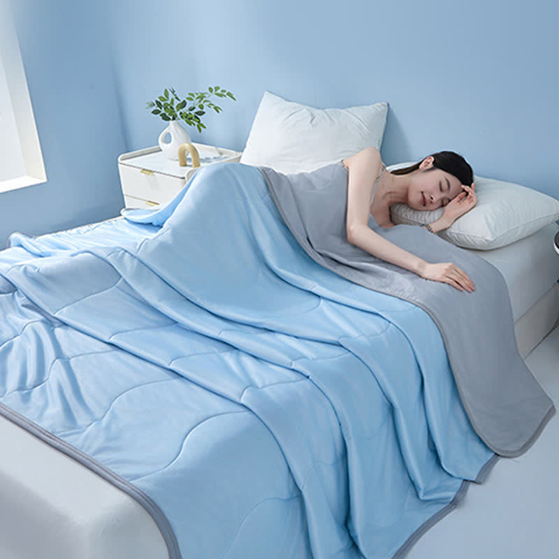 Couette rafraîchissante à structure ondulée unie