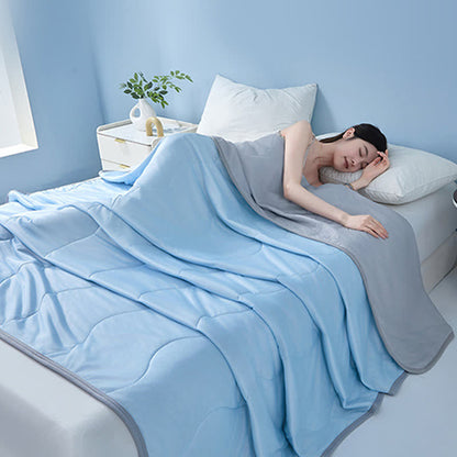 Couette rafraîchissante à structure ondulée unie