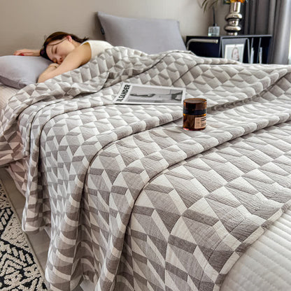 Couette en mousseline de coton à motif géométrique triangulaire