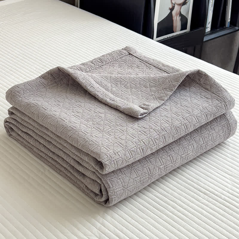 Couette en mousseline de coton à motif de grille géométrique