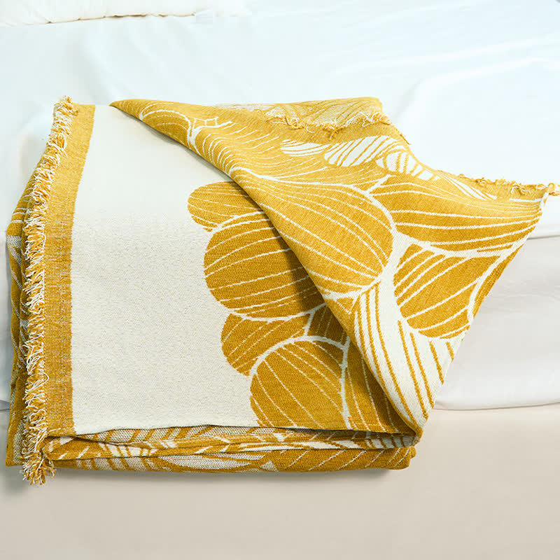 Couverture en chenille jacquard Daisy avec pompons