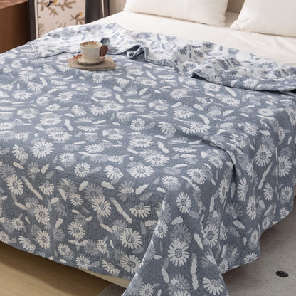 Couette en gaze de coton à motif marguerites bleues