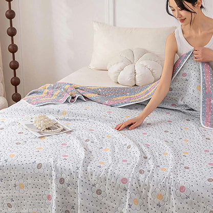 Couette réversible en coton à motif floral et à pois